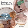 image:imageTiny Land Baby Beach Tent with Pool amp UV Protection Sunset Blush  Large 47 x 31 x 35 Popup Baby Tent with 3 Sand Pockets Easy Folding and Portable Carry Bag for Beach TripsSunset Blush